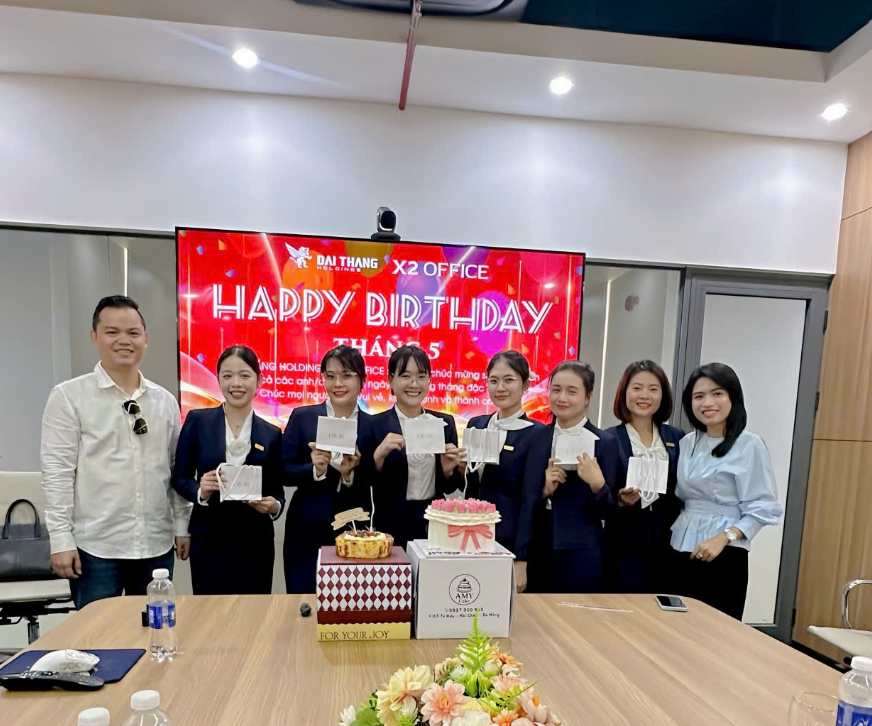 A happy moment at the May birthday celebration
